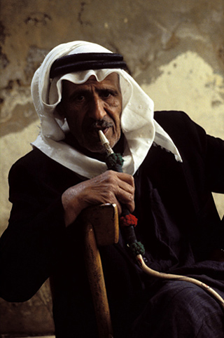 Syria. Aleppo. Smoker of hookah